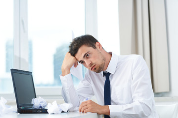 businessman working on his laptop in office