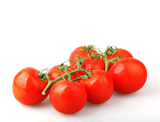Close-Up Of Red Tomatoes On White Background