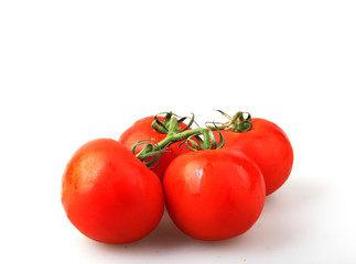 Close-Up Of Red Tomatoes On White Background