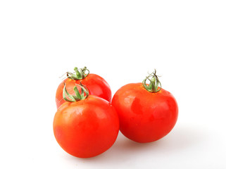 Close-Up Of Red Tomatoes On White Background