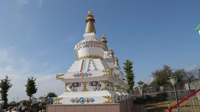 Buddhism stupa in front of monastery in Indian Tibet colony