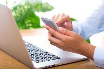 Closeup of a Businesswoman Using Smartphone