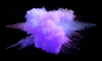 Collision of colored powder isolated on black