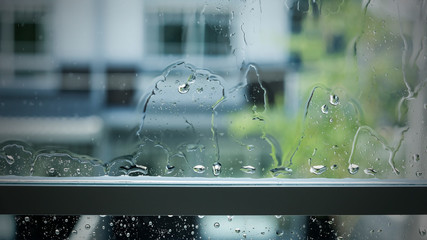 Water rain drop on the window at home