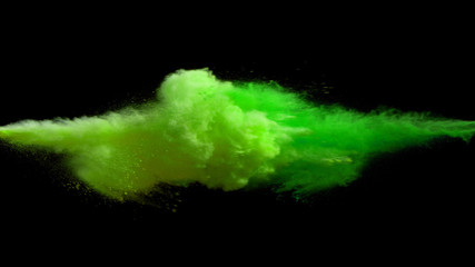Collision of colored powder isolated on black