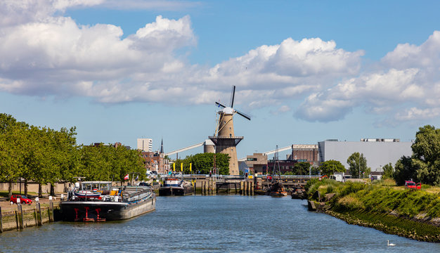 Rotterdam, Netherlands. Windmill at river Maas near the harbor.