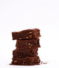 stack of baked square brownie chocolate chip pie with walnuts