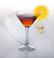 Martini Drink With Orange And Orange Peel