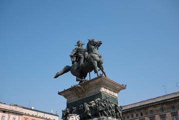 Fototapeta na wymiar Milan, Italy - June 25, 2019 : View of Vittorio Emanuele II statue in piazza Duomo