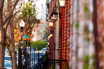Red brick houses with lamp on the walls, Baltimore - Powered by Adobe