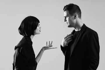 man and woman shaking hands