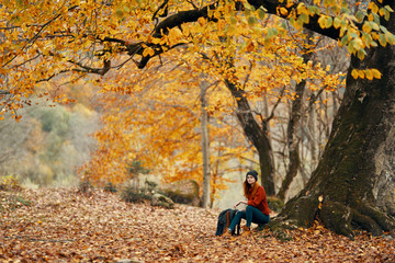 woman in autumn forest