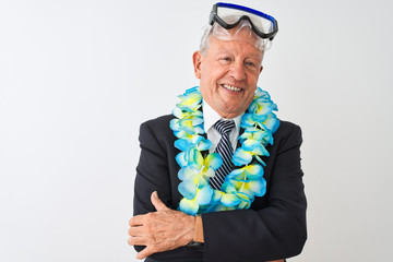 Senior businessman wearing suit hawaiian lei diving goggles over isolated white background happy face smiling with crossed arms looking at the camera. Positive person.