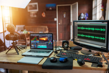 The content creator sound waves monitor preview in the freelance house studio