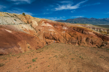 Woman in valley of Mars landscapes in the Altai Mountains, Kyzyl Chin, Siberia, Russia