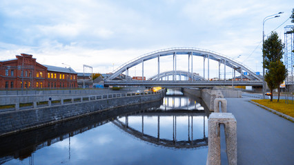 The American railway bridges on the Obvodny Channal in the evening. Industrial architecture in city center. St. Petersburg, Russia
