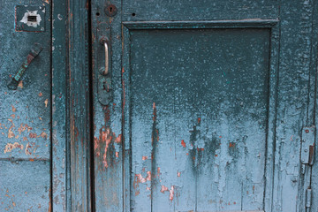 old wooden door with lock craquelure cracked paint