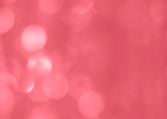 abstract bright bokeh background of coral color, space for text
