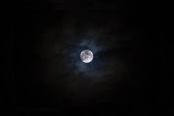 Naklejka na ściany i meble Full moon with clouds black background backdrop detail surface
