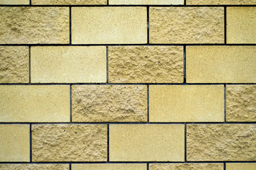 Fototapeta premium decorative brick beige wall background texture material block build