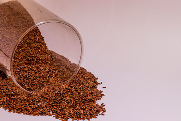 flax seeds on white background