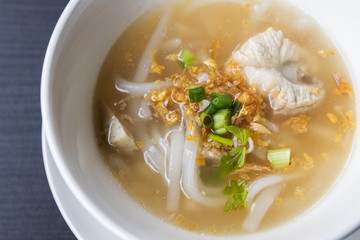 Pork spare ribs rice noodles soup; Vietnamese traditional food style.