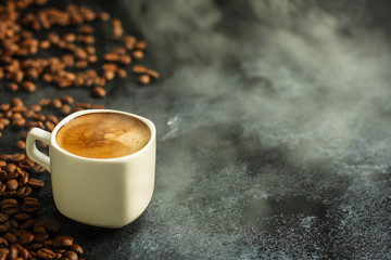 coffee freshly brewed in a white cup serving of beverage (coffee grain). food. top. copy space