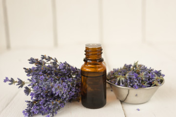 Obraz na płótnie Canvas Side photo bouquet of lavender bowl with fragrant flowers essential oil.