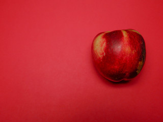 Peach with a red background