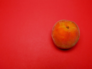 Peach with a red background