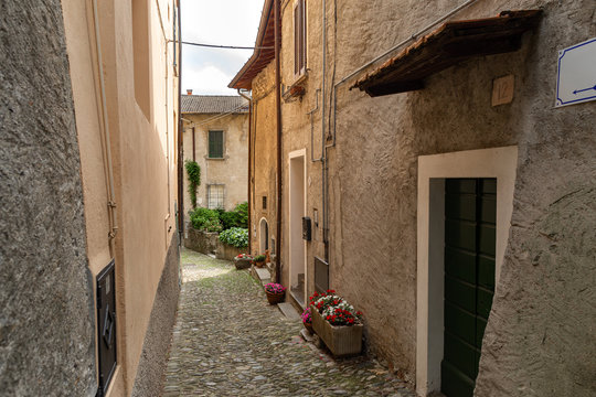 Fototapeta Beautiful narrow streets of Italy. Summer cityscape