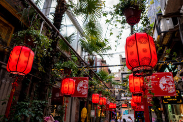 Shanghai, China - May 8 2019 : View of Tianzifang, a lot of small shops, cafes at alley with arts and crafts enclave