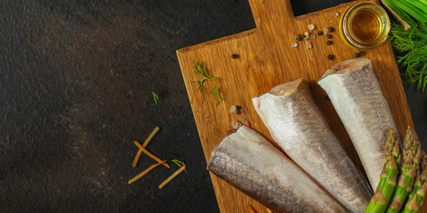 fish raw hake (set of ingredients for cooking). food background. top view. copy space