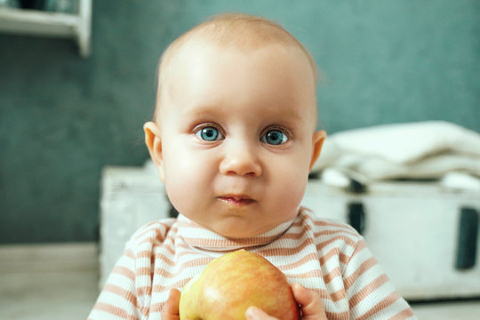 Cute kid eating an apple