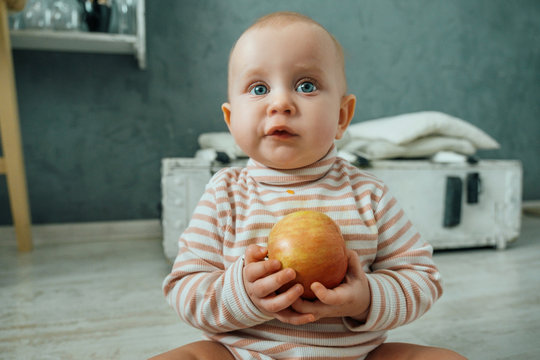 Cute kid eating an apple