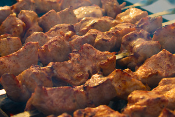 Obraz premium Grill dish. Meat on the coals. Skewers on charcoal.