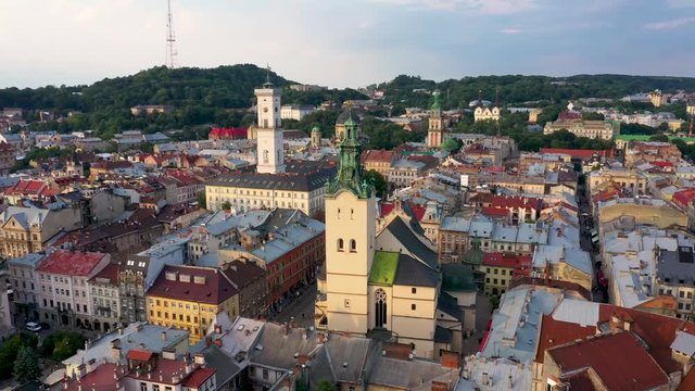 Aerial view of Lviv city center. Drone flies near City Hall. Ukraine, 4K