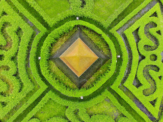 Aerial view Benchasiri Park next Sukhumvit street, Bangkok, Thailand. Green bush circular...