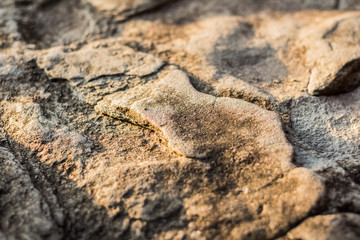 Stone background with small sunbeams