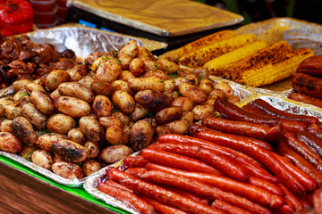 Fried potatoes with sausages