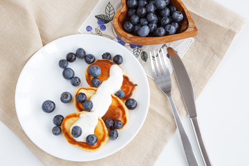 pancake with blueberries and cream