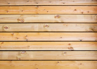 Wood pine plank untreated brown texture background.