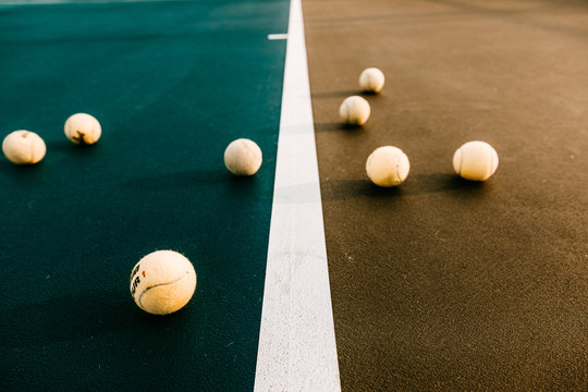 Close up of tennis balls on tennis court