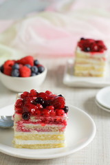 Summer dessert with delicate vanilla cream and fresh berries