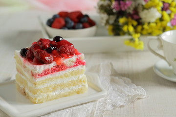 Summer dessert with delicate vanilla cream and fresh berries
