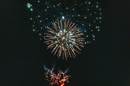 Fireworks explode in night sky
