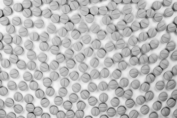 Pills, tablets on white background in black and white colour