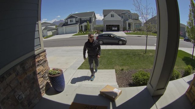 Security Camera Footage Of Man Stealing Package From Front Stoop / Lehi, Utah, United States