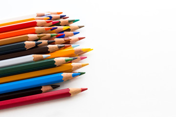 Figures with colored pencils on white background