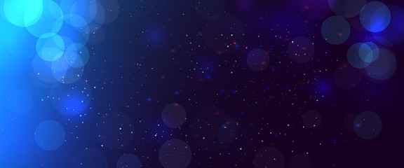 Abstract blurred bokeh blue background with circles. Christmas and New year holiday magic background with snow. Copy space